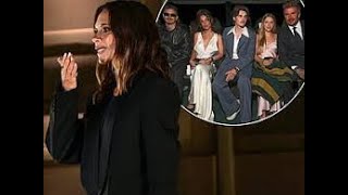 Victoria Beckham receives a rousing reception from her starstudded audience during her Paris [upl. by Also]