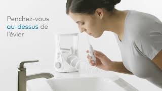 Apprenez à utiliser un hydropulseur jet dentaire Waterpik® Ultra Professional WP660 [upl. by Galvin]