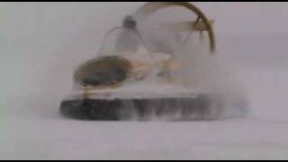 Universal Hovercraft UH14P modified racing around on snow covered Lake Geneva during a blizzard [upl. by Isak845]