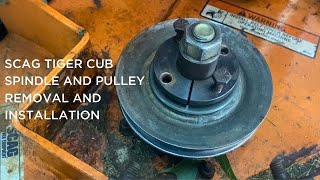 Scag Tiger Cub mower deck spindle hubpulley removal and installation [upl. by Nandor]