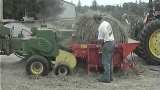 The St George Company  Altec Hay Unwinder on a John Deere 336 [upl. by Unders]