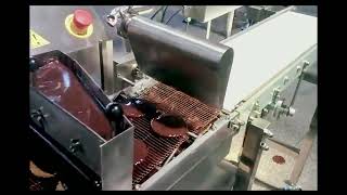 Chocolate depositing coating machine [upl. by Siladnerb]