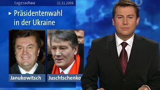 Tagesschau vor 20 Jahren 21112004  Jens Riewa und Reinhold Beckmann [upl. by Engelbert]