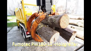 Fumotec Komatsu PW18010  Holzgreifer Timber logging  first test [upl. by Inimod]