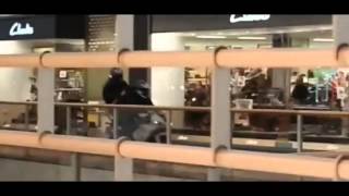 Armed bike gang raids store inside shopping 06112012 [upl. by Gona]