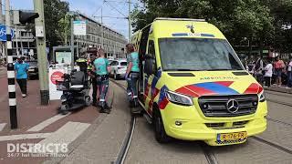 Scootmobiel in botsing met tram Hobbemaplein Den Haag [upl. by Ylevol]