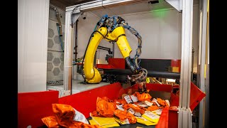 Vanderlande amp AWL deliver robot technology to DHL [upl. by Ggerg]