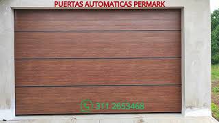 PERMARK Puertas Automáticas portón seccional en aluminio imitación madera color caoba [upl. by Vadnee884]