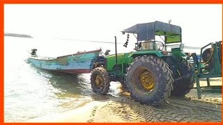 Big john Deere 5060 4wd pulling boat in beach  4×4 [upl. by Aivonas93]