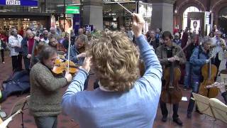 Flash mob at Copenhagen Central Station Copenhagen Phil playing Ravels Bolero [upl. by Gayner]