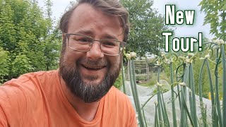 How we Grow Annual Vegetables in our Perennial Food Forest Raised Beds amp Plant Nursery Tour [upl. by Aldarcy]