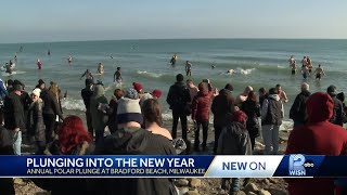 Thousands welcome in new year with polar plunge [upl. by Elli]