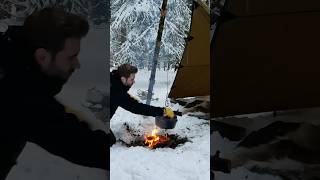 Pizza baking in the snow wintersurvival campfire snow pizza survival campfirecooking [upl. by Colfin302]