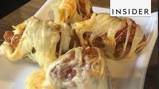 Korean Restaurant Wraps Spicy Chicken In Melted Cheese [upl. by Namya407]