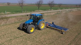 Weizen stiegeln  Treffler Striegel 9m  New Holland TS 115 [upl. by Arsi923]