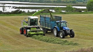 Claas 860 And 3 New Hollands [upl. by Inanak]