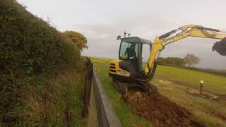 Digging a pathway with a Yanmar Mini Digger Excavator [upl. by Gearhart]