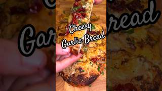 Tasty Cheesy Garlic Bread Recipe food yummy cheese bread garlic garlicbread trending tasty [upl. by Togram]