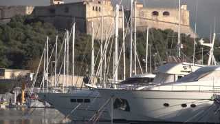 Antibes France Old Town with ancient church narrow lanes food market pedestrian zone marina [upl. by Innep277]