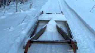 Grooming the skidoo trail with homemade drag [upl. by Ailemac]