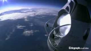 Daredevil skydiver Felix Baumgartner completes death defying leap from 18 miles up [upl. by Ailehc]