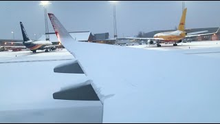 SNOWY 737800 Takeoff after Snowstorm Taxi Deice Takeoff [upl. by Lechar228]