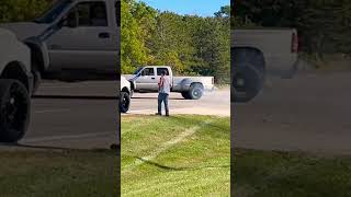 Big Diesel Trucks laying Rubber after the Show burnout truck cummins duramax diesel [upl. by Ardekahs]