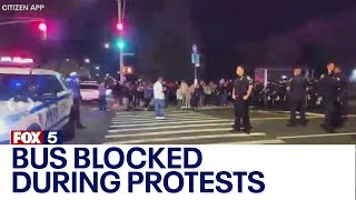 NYC migrant crisis Staten Island demonstrators block bus during protests [upl. by Sol]