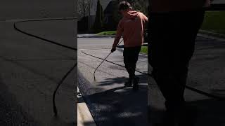 Driveway Sealing  Spraying the Sealer [upl. by Intyrb980]