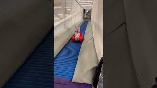 Child slides down conveyor belt at Uppsala bus factory [upl. by Delphine]