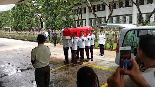 Pallbearers carrying the coffin past the family into the service hall [upl. by Euqininod409]