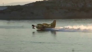 Canadair CL415 water bombers and idiots with boats [upl. by Mosa]