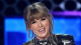 Taylor Swift TEASES TS7 amp Wins Artist of the Year at 2018 AMAs [upl. by Sapphire962]