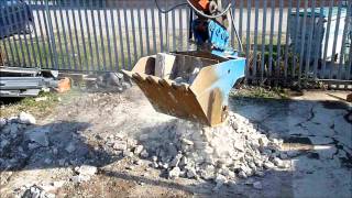 Elvington Plant Hire Crusher Bucket crushing Reinforced Concrete and Blockswmv [upl. by Florri]