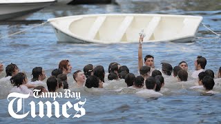 Tarpon Springs 2022 Epiphany celebration cross dive explained [upl. by Adnaluoy]