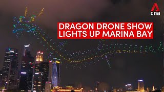 Dragon made up of drones lights up Singapores Marina Bay for Legend of the Dragon Gate show [upl. by Attenat]