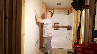 OUR FIRST REAL ROOM Drywalling Garage Bathroom [upl. by Enyr]