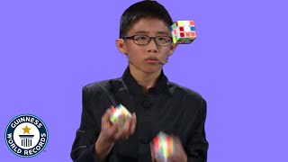 He JUGGLED and SOLVED 3 Rubiks cubes  Guinness World Records [upl. by Ahsilahs198]