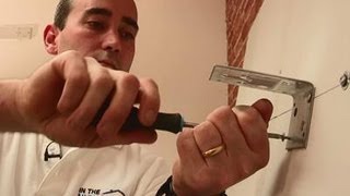 How To Attach Brackets To Drywall [upl. by Dumanian118]