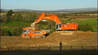 Hitachi Zaxis 870 LCH excavator earthmoving with Hitachi EH1100 dump trucks [upl. by Retse657]