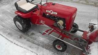 MARCH 25 2013 VIRGIL SNOWSTORM USING THE 1967 WHEEL HORSE LAWN RANGER AND SNOWBLOWER [upl. by Kcirej951]