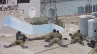 Israeli soldiers celebrate shooting a Palestinian youth [upl. by Peggi]