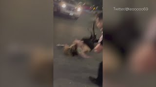 Viral video shows security guard slamming woman to the pavement in parking lot brawl [upl. by Normalie]