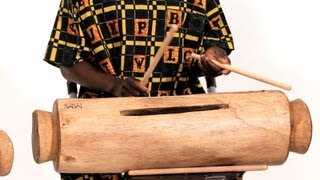 How to Play the Log Drum  African Drums [upl. by Norha271]