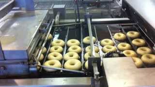 Krispy Kreme Doughnuts Assembly Line  Cooking and Glazing Donuts in Atlanta making the donuts [upl. by Kohl]