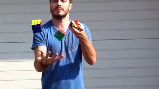 Guy solves Rubiks Cube while juggling [upl. by Buine]