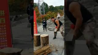 The process of splitting half dry wood with the iron ax [upl. by Yul]