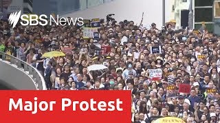 Hong Kong protesters target train station to educate Chinese mainlanders [upl. by Ahsilat]