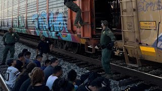 More than 20 migrants found stowed away in locked train compartment in Laredo [upl. by Cynthy535]