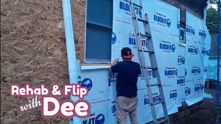 SHEATHING THE EXTERIOR WALLS AND INSTALLING BLOCK IT HOUSE WRAP REHAB WITH DEE [upl. by Dnomso]